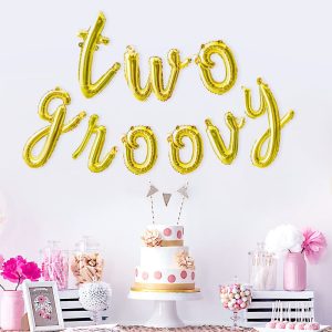 Groovy Letter Balloons Set with birthday cake and pompom decorations