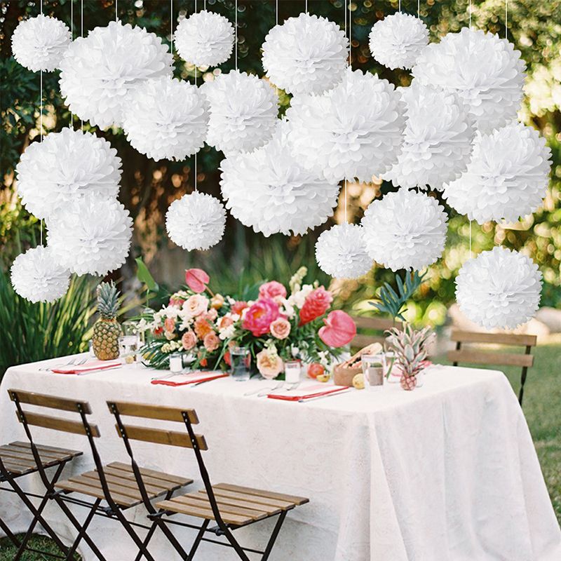 white flower pompom wedding party decorations outdoor