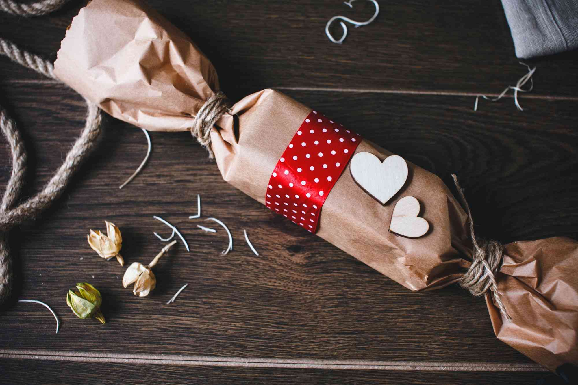 Christmas cracker caramel shaped brown package with hearts