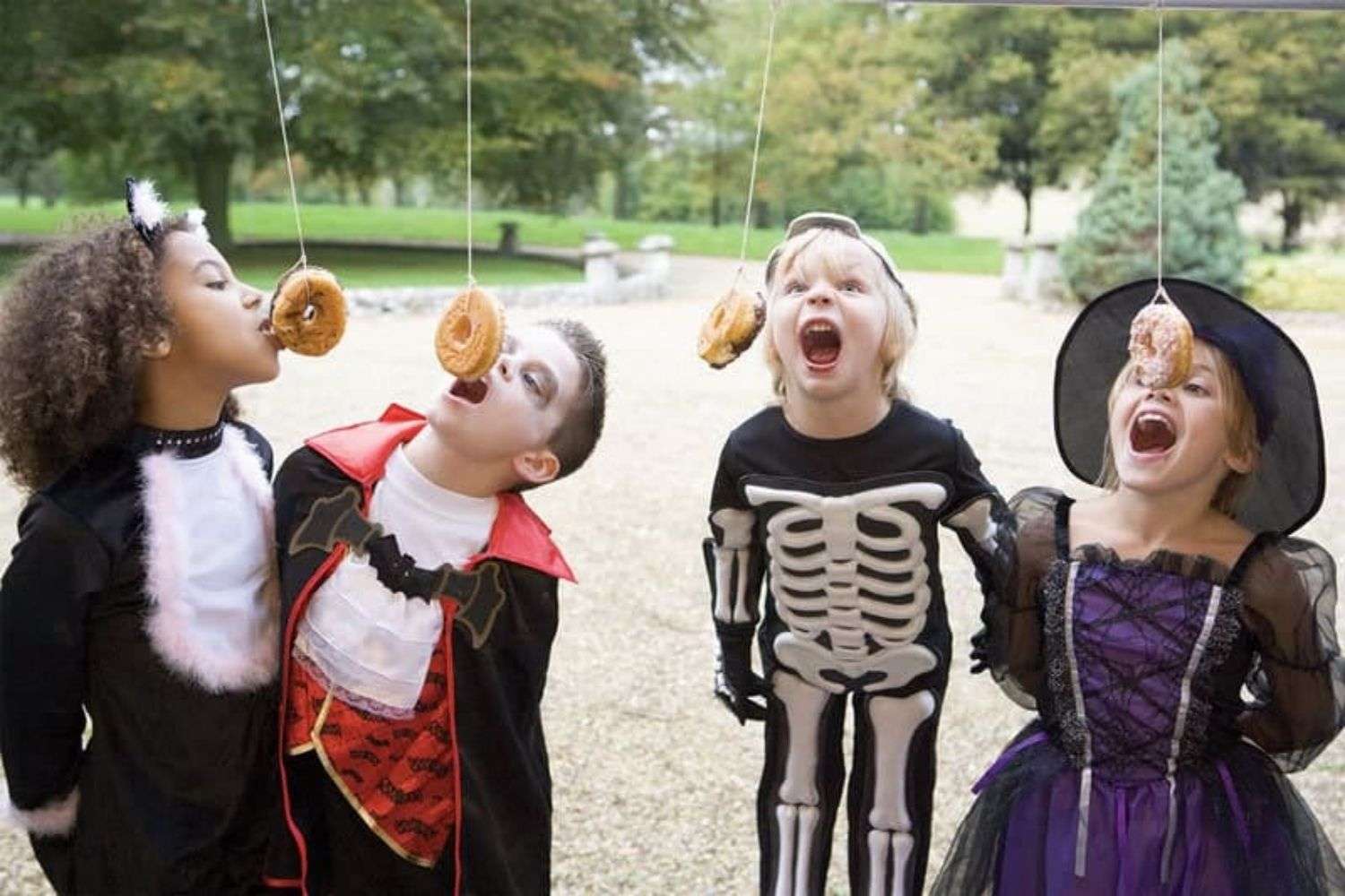 Donut Eating Contest Halloween Party Games for kids donut on a string