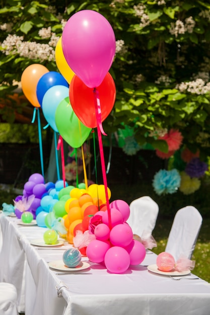 birthday table with rainbow balloons summer party themes