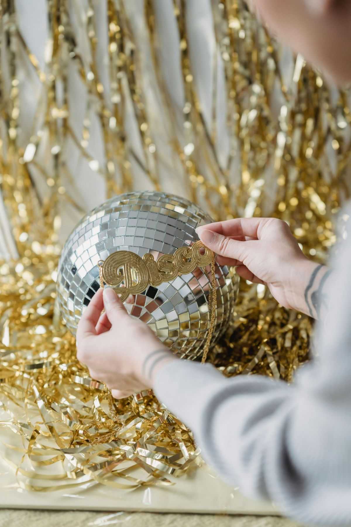 disco ball with gold tassel decorations