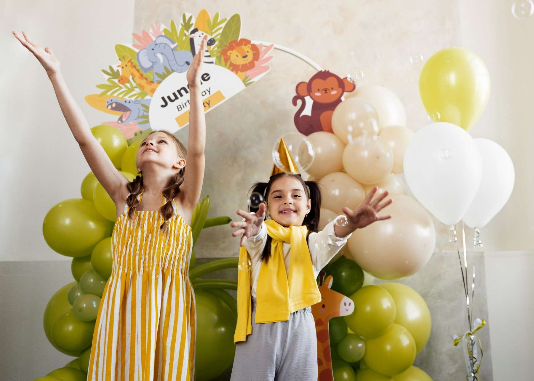 front view smiley girls having fun balloons