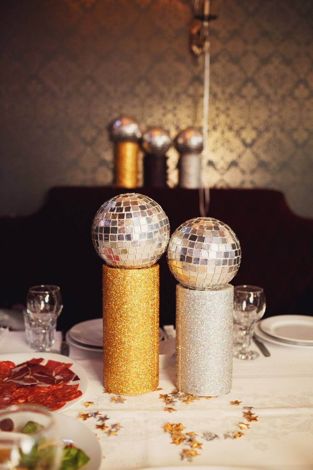 little disco balls put tubes dinner table