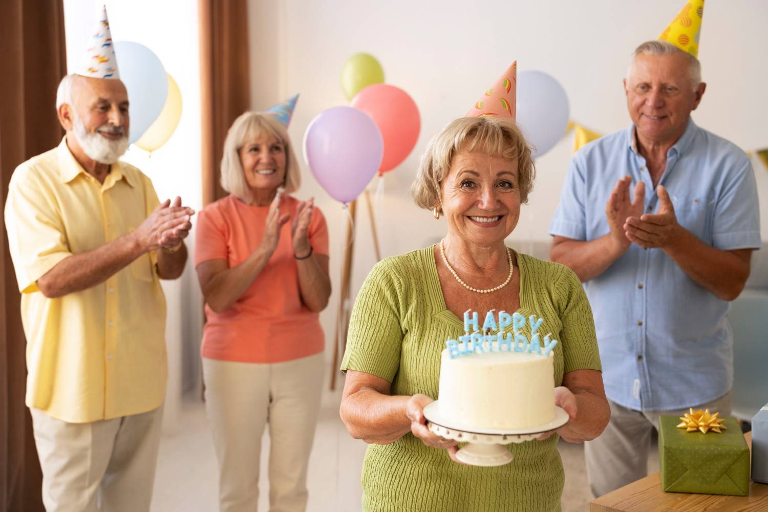 woman posing with cake her birthday party