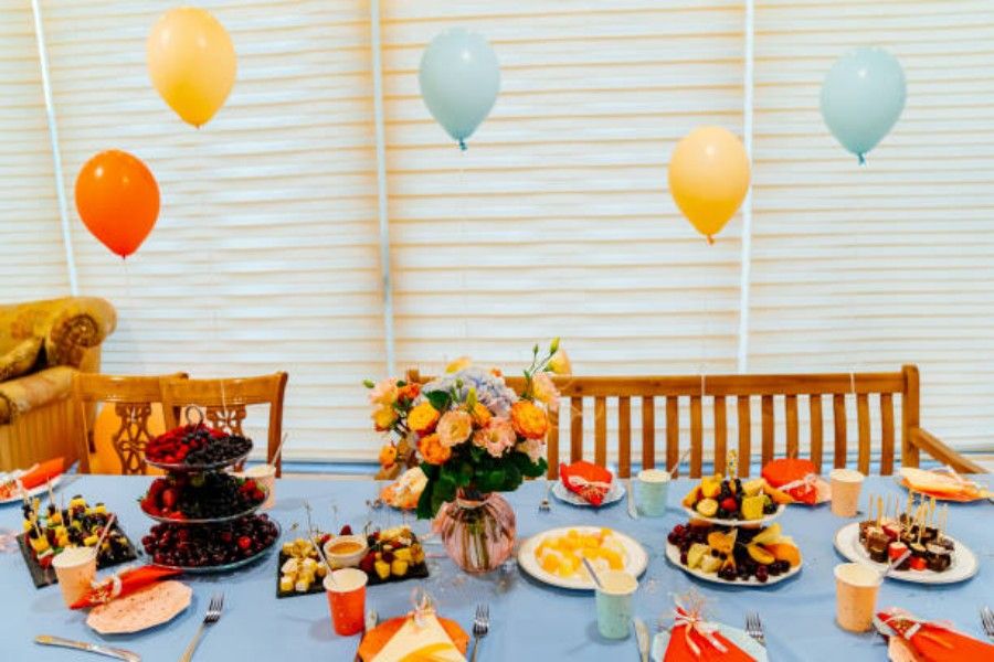 festive table at summer children party celebration